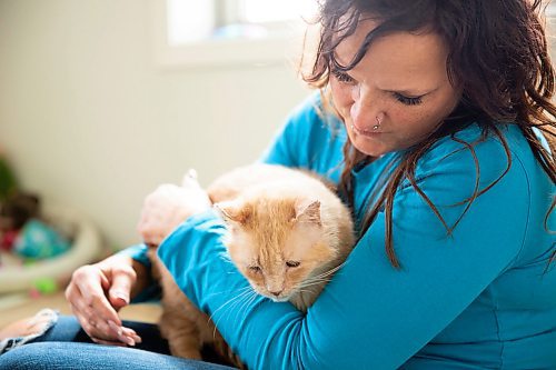 MIKAELA MACKENZIE/WINNIPEG FREE PRESS
Dale, a street cat who was saved by a number of people working together to socialize him to be the affectionate and approachable cat he is now, and his foster mom Brenda Meyer in St. Andrews on Tuesday, April 30, 2019. For Ashley Prest story.
Winnipeg Free Press 2019