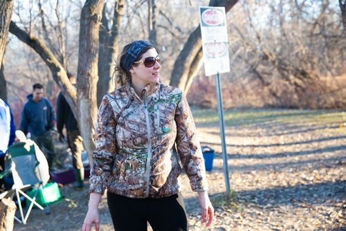 MIKAELA MACKENZIE/WINNIPEG FREE PRESS
Nadine De Rocquigny waits on the bank to help grab fish while sucker fishing on Thursday, April 18, 2019. 
Winnipeg Free Press 2019