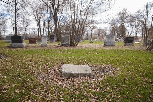 MIKE DEAL / WINNIPEG FREE PRESS
The headstone for Matilda Russell is missing, all that remains is the concrete base.
Paul Moist, past president of CUPE, Brookside Cemetery tour coordinator, does tours of the cemetery, focusing on 14 people from the strike demonstration, who are buried at Brookside.
190430 - Tuesday, April 30, 2019.

see Jessica Botelho-Urbanski story
