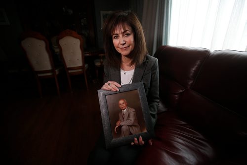 JOHN WOODS / WINNIPEG FREE PRESS
Belle Jarniewski, executive director of Jewish Heritage Centre of Western Canada, holds a photo pf her father Sam in her home in Winnipeg Tuesday, April 30, 2019. Sam Jarniewski, a Holocaust survivor, was liberated from Dachau concentration camp and was among 2500 Jewish tailors and their families who immigrated to Canada through the 1948-49 Tailors Project.

Reporter: Sanders