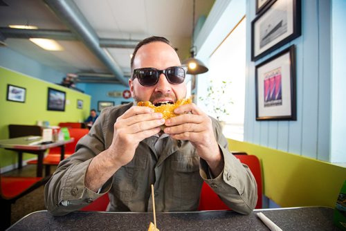 MIKAELA MACKENZIE/WINNIPEG FREE PRESS
Carew Duffy, also known as Sandwiches & Selfies on instagram, eats a sandwich at the White Star Diner in Winnipeg on Wednesday, May 1, 2019. For Dave Sanderson story.
Winnipeg Free Press 2019