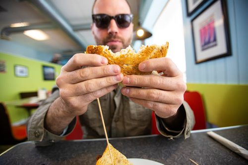 MIKAELA MACKENZIE/WINNIPEG FREE PRESS
Carew Duffy, also known as Sandwiches & Selfies on instagram, eats a sandwich at the White Star Diner in Winnipeg on Wednesday, May 1, 2019. For Dave Sanderson story.
Winnipeg Free Press 2019