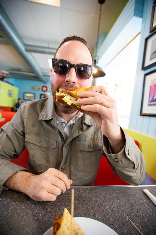 MIKAELA MACKENZIE/WINNIPEG FREE PRESS
Carew Duffy, also known as Sandwiches & Selfies on instagram, eats a sandwich at the White Star Diner in Winnipeg on Wednesday, May 1, 2019. For Dave Sanderson story.
Winnipeg Free Press 2019