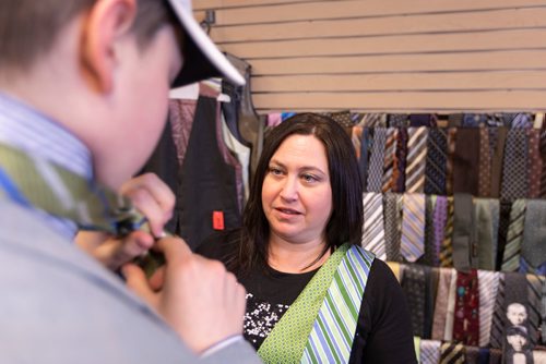 SASHA SEFTER / WINNIPEG FREE PRESS
Dana Binder, founder of Suit Up Winnipeg helps Grant Park High School student Misha Viner (16) pick out and tie his new tie in Suit Up's headquarters located at 675 Empress Street in Winnipeg's Minto neighbourhood.
190501 - Wednesday, May 01, 2019.