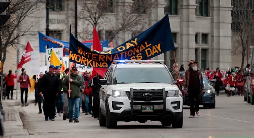 PHIL HOSSACK / WINNIPEG FREE PRESS - Participants (About 200) in the annual May Day parade march up Main Street towards Broadway Market Square Wednesday evening. The March ended about an hour later at Market Square. See release.  - May1, 2019.