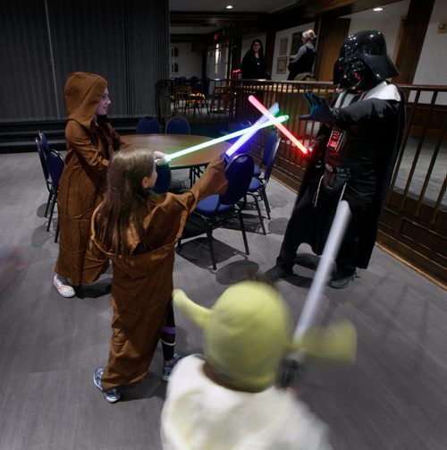 PHIL HOSSACK / WINNIPEG FREE PRESS - FAITH
Rabbi Anibal Mass AKA Darth Vader poses with a posse of your Jedi Warriors at Shaarey Zedek Synagogue Wednesday. See Brenda Suderman's story. - May1, 2019.