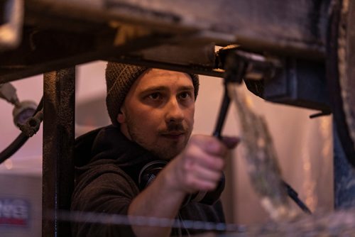 SASHA SEFTER / WINNIPEG FREE PRESS
Owner of WPG Timber Co. Mike McGarry repairs a saw blade while processing diseased ash trees into usable lumber in his warehouse in Winnipeg's Chevrier neighbourhood.
190501 - Wednesday, May 01, 2019.