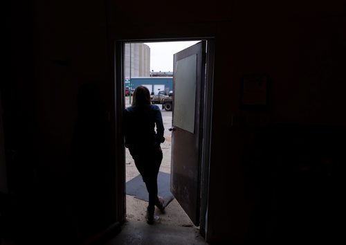 SASHA SEFTER / WINNIPEG FREE PRESS
Carlee Farmer stands in the doorway of the Wpg Timber Co. warehouse in Winnipeg's Chevrier neighbourhood.
190501 - Wednesday, May 01, 2019.