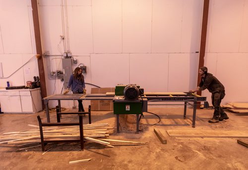 SASHA SEFTER / WINNIPEG FREE PRESS
Owner of WPG Timber Co. Mike McGarry and his girlfriend Carlee Farmer process diseased ash trees into usable lumber in McGarry's warehouse in Winnipeg's Chevrier neighbourhood.
190501 - Wednesday, May 01, 2019.