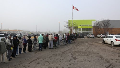 MIKE DEAL / WINNIPEG FREE PRESS
The new FreshCo grocery store is open at McPhilips and Jefferson and people are lined up for a chance to win a $5 dollar gift card. If you want to skip that and go right in the store is open for business. 
190502 - Thursday, May 2, 2019