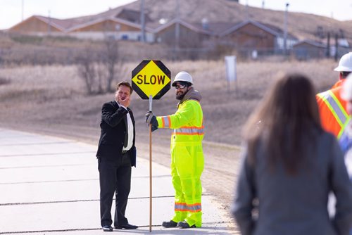 SASHA SEFTER / WINNIPEG FREE PRESS
Minister of Infrastructure Ron Schuler (left) stops to talk with road worker Wade Chomokovski (right) before giving a press conference about plans to build a new bridge over the Red River Floodway on PTH 59 to replace the existing damaged one.
190502 - Thursday, May 02, 2019.