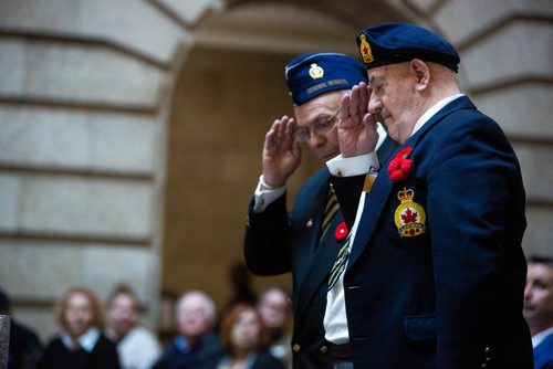 MIKAELA MACKENZIE/WINNIPEG FREE PRESS
Barrie Wiseman (right) and Dave Chochinov with the General Monash Branch of the Royal Canadian Legion salute after laying the first ceremonial stone with  at an annual public commemorative service held in remembrance of the Holocaust at the Manitoba Legislative Building in Winnipeg on Thursday, May 2, 2019. 
Winnipeg Free Press 2019