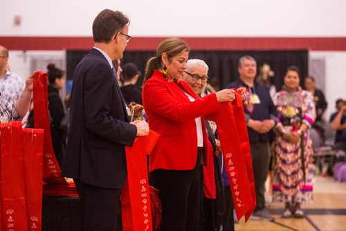 MIKAELA MACKENZIE / WINNIPEG FREE PRESS
Executive director of indigenous strategies Rebecca Chartrand takes a look at the new Indigenous stoles before presenting them to graduates at the Graduation Pow Wow on Friday, May 3, 2019. For Alex Paul story.
Winnipeg Free Press 2019.