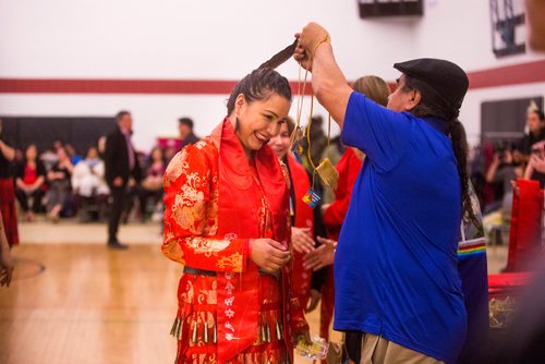 MIKAELA MACKENZIE / WINNIPEG FREE PRESS
Red River college transition program graduate Christine Daniels is presented with a medicine bag by elder Paul Guimond after receiving a new Indigenous stoles at the Graduation Pow Wow on Friday, May 3, 2019. For Alex Paul story.
Winnipeg Free Press 2019.