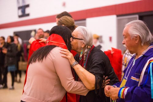 MIKAELA MACKENZIE / WINNIPEG FREE PRESS
Red River culinary arts graduate Raven de Freitas hugs elder Mae Louise Campbell at the Graduation Pow Wow on Friday, May 3, 2019. For Alex Paul story.
Winnipeg Free Press 2019.