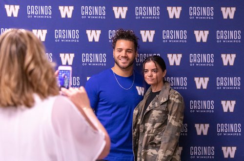 SASHA SEFTER / WINNIPEG FREE PRESS
Winnipeg Blue Bombers 14th overall pick in Thursday nights CFL Draft Brady Oliveira takes a picture with his sister Kallee Oliveira.
190503 - Friday, May 03, 2019.