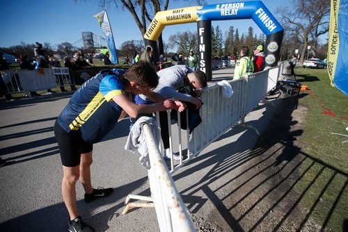 JOHN WOODS / WINNIPEG FREE PRESS
Runners recover after completing the Winnipeg Police Service Half Marathon at Assiniboine Park in Winnipeg Sunday, May 5, 2019.

Reporter: Alex