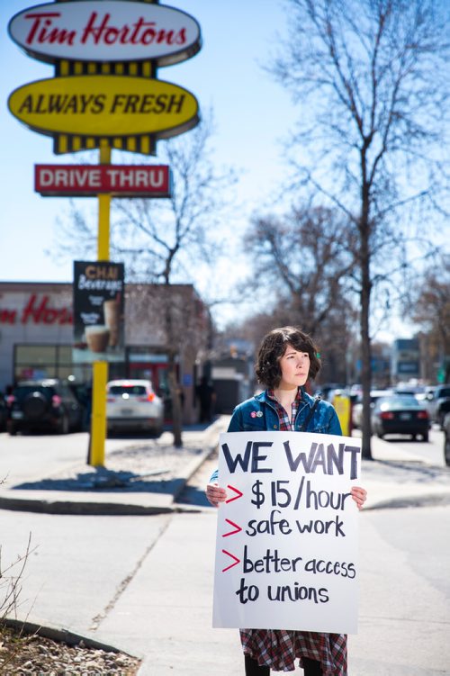 MIKAELA MACKENZIE / WINNIPEG FREE PRESS
Local activist Emily Leedham poses for a portrait on Maryland street in Winnipeg on Tuesday, May 7, 2019. For Jessica Botelho-Urbanski story.
Winnipeg Free Press 2019.