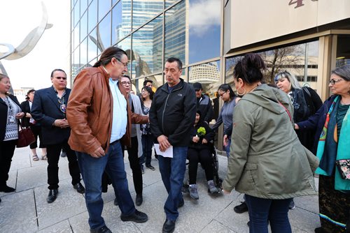 RUTH BONNEVILLE / WINNIPEG FREE PRESS 

George Wood, father of murder victim Christine Wood, is comforted as he makes his way toward the media to make a statement regarding the sentencing of Brett Overby who was convicted of 2nd degree murder, on Wednesday outside the Law Courts building 

May 8, 2019

