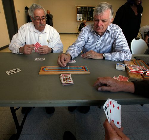 PHIL HOSSACK / WINNIPEG FREE PRESS - Twice a week retiree's gather at the Woodhaven CC where the "Mens Shack" hangs out over coffee carving and conversation.Howard Lancaster (left) and Warren Loewen, count points in a game of cribbage.  - .....See Brenda Suderman's story. .  - May 8, 2019.