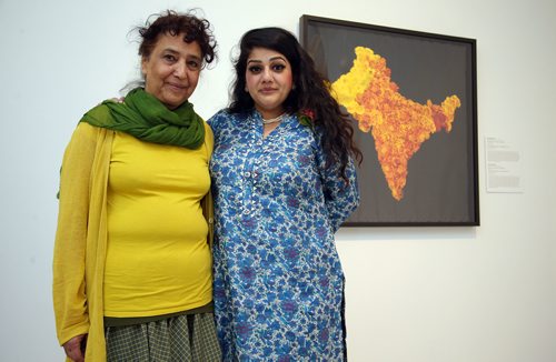 JASON HALSTEAD / WINNIPEG FREE PRESS

Artists Sarindar Dhaliwal (left) and Divya Mehra with Dhaliwal's work entitled 'The Cartographer's Mistake: the Radcliffe Line' at the gala opening for Vision Exchange: Perspectives from India to Canada at the Winnipeg Art Gallery on May 8, 2019. The show opens to the public on May 11, 2019.