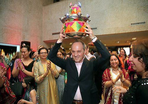 JASON HALSTEAD / WINNIPEG FREE PRESS

Winnipeg Art Gallery director and CEO Stephen Borys takes part in the Jaago dance at the gala opening for Vision Exchange: Perspectives from India to Canada at the Winnipeg Art Gallery on May 8, 2019. The show opens to the public on May 11, 2019.