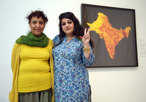 JASON HALSTEAD / WINNIPEG FREE PRESS

Artists Sarindar Dhaliwal (left) and Divya Mehra with Dhaliwal's work entitled 'The Cartographer's Mistake: the Radcliffe Line' at the gala opening for Vision Exchange: Perspectives from India to Canada at the Winnipeg Art Gallery on May 8, 2019. The show opens to the public on May 11, 2019.