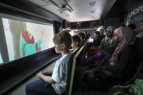 RUTH BONNEVILLE / WINNIPEG FREE PRESS 

LOCAL - Students from Mulvey School watch a video on Hope while seated on the  Simon Wiesenthal Centers  Humanity Bus while it's stopped at their school for classroom teaching sessions on Thursday.  

More info:
On May 9 and 10, students in Winnipeg will welcome the acclaimed Tour for Humanity (@TourForHumanity) bus from the Friends of Simon Wiesenthal Center for Holocaust Studies (FSWC). 
The Tour for Humanity is a 30-seat, wheelchair accessible, state-of-the-art, technologically advanced mobile human rights education centre that teaches students, educators, community leaders, and front-line professionals about topics of diversity, democracy, and Canadian civic rights and responsibilities.

 

Ashley Prest story.

May 9, 2019

