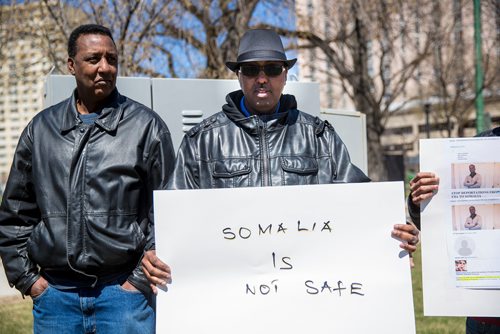 MIKAELA MACKENZIE / WINNIPEG FREE PRESS
Yahya Hashim, Somali community centre program manager (centre), and Abdi Kerow (left) at a rally against deportation of Somalis at Central Park in Winnipeg on Thursday, May 9, 2019.  The demonstration was instigated by CBSA deportation of young Somali men who haven't lived there in decades and are in danger. For Carol Sanders story.
Winnipeg Free Press 2019.