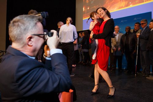 MIKE DEAL / WINNIPEG FREE PRESS
Koko, 3, gives her mom, Marli Sakiyama, a kiss after she won the Academy Road BIZ award while being photographed by John Giavedoni during the Mayor's BIZ Awards at the Metropolitan Entertainment Centre Thursday afternoon. The awards recognize exemplary work that contributs to BIZ programs across the city.
190509 - Thursday, May 09, 2019.