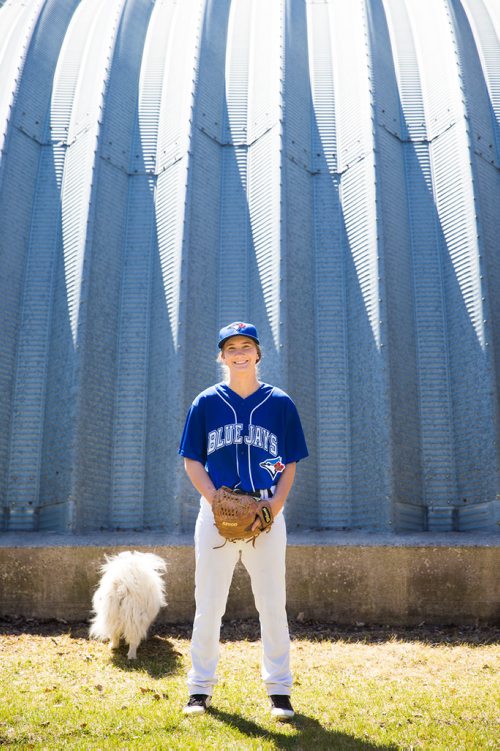 MIKAELA MACKENZIE / WINNIPEG FREE PRESS
Brittney Langlais poses for portraits with her dog, Lily, on her property near Garson, Manitoba on Thursday, May 9, 2019. Langlais is one of two first female players on the Manitoba Junior Baseball League. For Jason Bell story.
Winnipeg Free Press 2019.