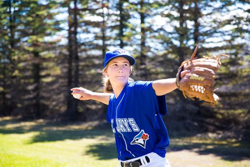 MIKAELA MACKENZIE / WINNIPEG FREE PRESS
Brittney Langlais poses for portraits on her property near Garson, Manitoba on Thursday, May 9, 2019. Langlais is one of two first female players on the Manitoba Junior Baseball League. For Jason Bell story.
Winnipeg Free Press 2019.