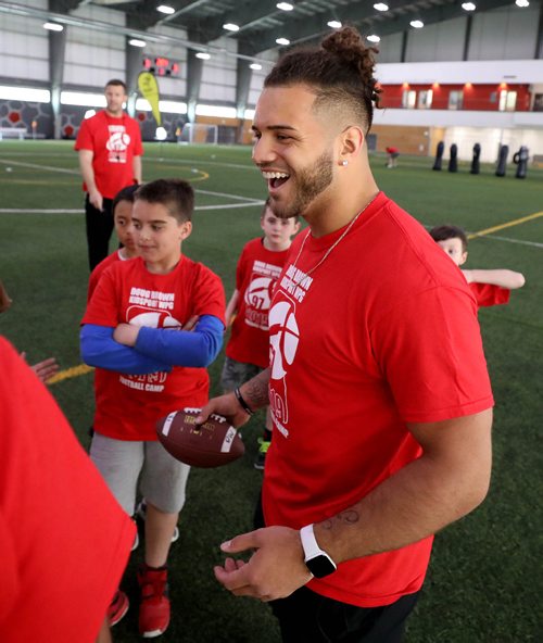 RUTH BONNEVILLE / WINNIPEG FREE PRESS 

Winnipeg Blue Bomber, Brady Oliveira, helps coach kids at the 10th annual KidSport Winnipeg Football Camp held at the Axworthy Health & RecPlex on Saturday.

See Ashley Prest story. 

May 11, 2019
