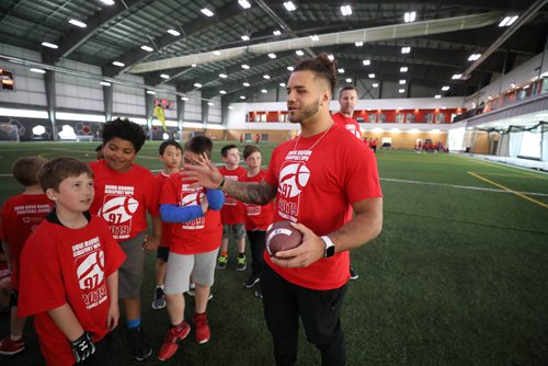 RUTH BONNEVILLE / WINNIPEG FREE PRESS 

Winnipeg Blue Bomber, Brady Oliveira, helps coach kids at the 10th annual KidSport Winnipeg Football Camp held at the Axworthy Health & RecPlex on Saturday.

See Ashley Prest story. 

May 11, 2019
