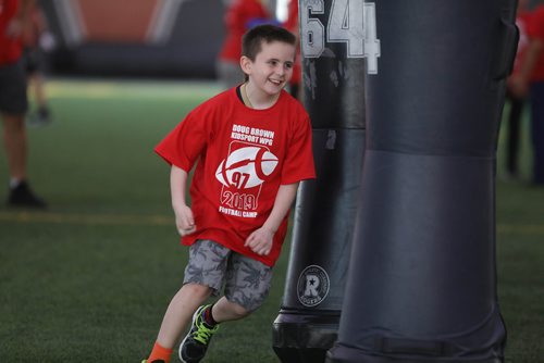 RUTH BONNEVILLE / WINNIPEG FREE PRESS 

Storm Jackson makes his way around tackling bags as he  takes part in the  10th annual KidSport Winnipeg Football Camp held at the Axworthy Health & RecPlex on Saturday.

See Ashley Prest story. 

May 11, 2019
