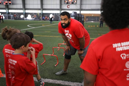 RUTH BONNEVILLE / WINNIPEG FREE PRESS 


Obby Khan helps teach kids how to play football during  the 10th annual KidSport Winnipeg Football Camp held at the Axworthy Health & RecPlex on Saturday.

See Ashley Prest story. 

May 11, 2019
