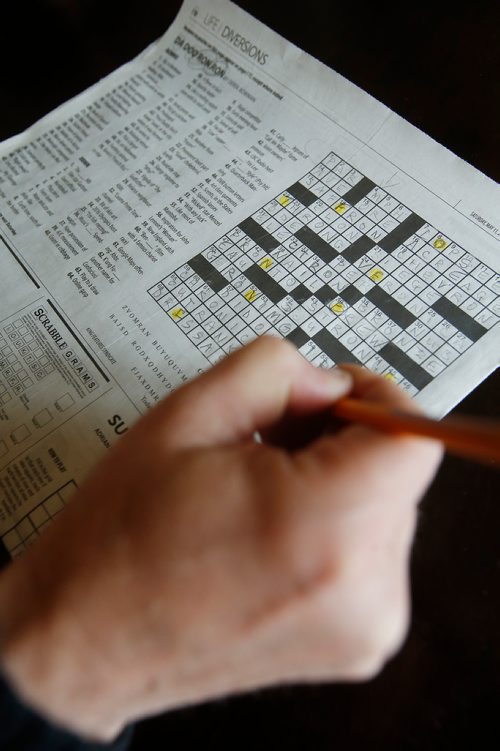 JOHN WOODS / WINNIPEG FREE PRESS
Ron and Leanne Cadieux complete a personalized crossword that Leanne had created for Rons birthday in their Winnipeg home Sunday, May 12, 2019.

Reporter: Zoratti