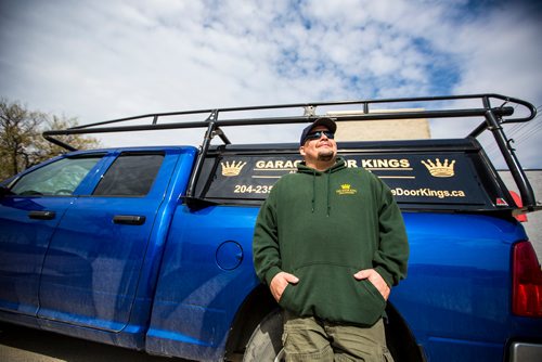 MIKAELA MACKENZIE / WINNIPEG FREE PRESS
Garage Door King Stan Summers poses for a portrait on Logan Ave. in Winnipeg on Monday, May 13, 2019.  For Dave Sanderson story.
Winnipeg Free Press 2019.