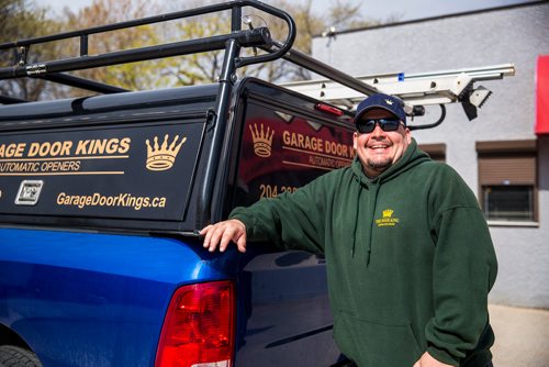 MIKAELA MACKENZIE / WINNIPEG FREE PRESS
Garage Door King Stan Summers poses for a portrait on Logan Ave. in Winnipeg on Monday, May 13, 2019.  For Dave Sanderson story.
Winnipeg Free Press 2019.