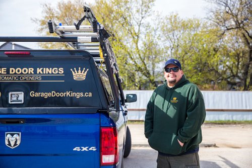 MIKAELA MACKENZIE / WINNIPEG FREE PRESS
Garage Door King Stan Summers poses for a portrait on Logan Ave. in Winnipeg on Monday, May 13, 2019.  For Dave Sanderson story.
Winnipeg Free Press 2019.