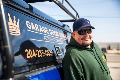 MIKAELA MACKENZIE / WINNIPEG FREE PRESS
Garage Door King Stan Summers poses for a portrait on Logan Ave. in Winnipeg on Monday, May 13, 2019.  For Dave Sanderson story.
Winnipeg Free Press 2019.