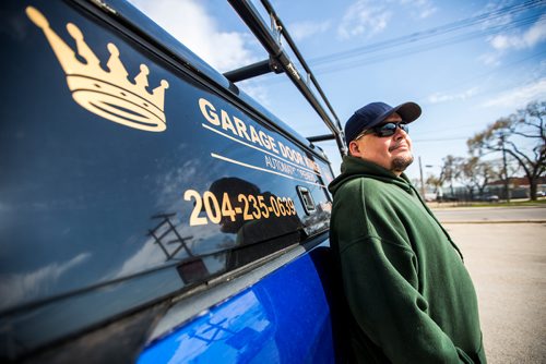 MIKAELA MACKENZIE / WINNIPEG FREE PRESS
Garage Door King Stan Summers poses for a portrait on Logan Ave. in Winnipeg on Monday, May 13, 2019.  For Dave Sanderson story.
Winnipeg Free Press 2019.