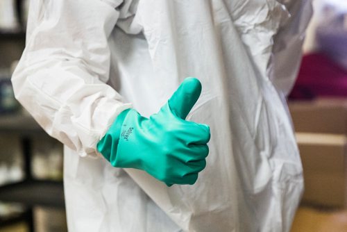 MIKAELA MACKENZIE / WINNIPEG FREE PRESS
Scott Rose, owner and general manager of WinMar property restoration, gives a thumbs up in full cleanup gear at their facility in Winnipeg on Monday, May 13, 2019.  For Erin Lebar story.
Winnipeg Free Press 2019.