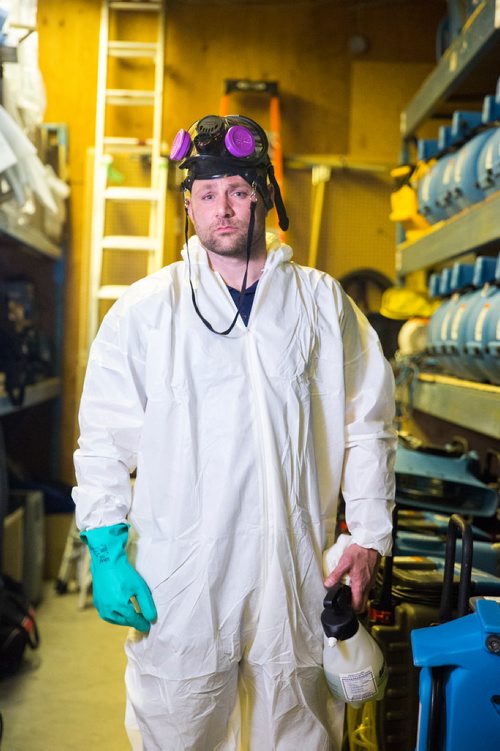 MIKAELA MACKENZIE / WINNIPEG FREE PRESS
Scott Rose, owner and general manager of WinMar property restoration, poses for a portrait in cleanup gear with stored air moving machines and dehumidifiers at their facility in Winnipeg on Monday, May 13, 2019.  For Erin Lebar story.
Winnipeg Free Press 2019.