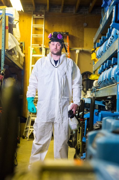 MIKAELA MACKENZIE / WINNIPEG FREE PRESS
Scott Rose, owner and general manager of WinMar property restoration, poses for a portrait in cleanup gear with stored air moving machines and dehumidifiers at their facility in Winnipeg on Monday, May 13, 2019.  For Erin Lebar story.
Winnipeg Free Press 2019.