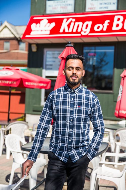 MIKAELA MACKENZIE / WINNIPEG FREE PRESS
Aman Bajwa, owner of King of Butter Chicken, poses for portraits by his restaurant in Winnipeg on Tuesday, May 14, 2019.  For Dave Sanderson story.
Winnipeg Free Press 2019.