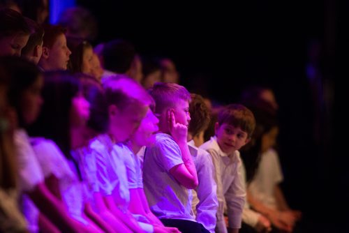 MIKAELA MACKENZIE / WINNIPEG FREE PRESS
Grade four, five, and six choir students in the Winnipeg School Division Divisional Elementary Choir listen after performing with the Winnipeg Symphony Orchestra as part of the Adventures in Music program at the Centennial Concert Hall in Winnipeg on Tuesday, May 14, 2019. 
Winnipeg Free Press 2019.