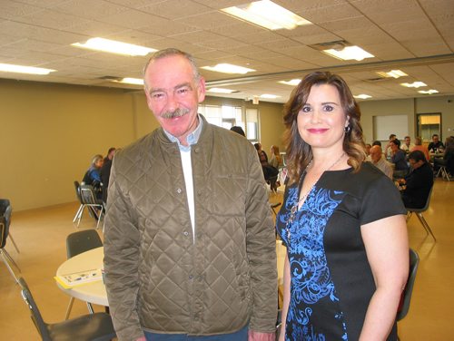Canstar Community News April 25, 2018 - Portage la Prairie mayor Irvine Ferris and Local Immigration Partnership Program coordinator Michelle Cudmore-Armstrong are shown at the Forced to Flee simulation held in Portage's Stride Place on April 25. (ANDREA GEARY/CANSTAR COMMUNITY NEWS)