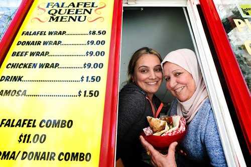 RUTH BONNEVILLE / WINNIPEG FREE PRESS 

Royal Names Feature - Falafel Queen food truck

Daughter mother falafel Queens, Jumana Zeid and her mother  Khetam Zeid  in their Falafel Queen food truck on Broadway and Carlton.  

See Dave Sanderson story.  

May 14, 2019

