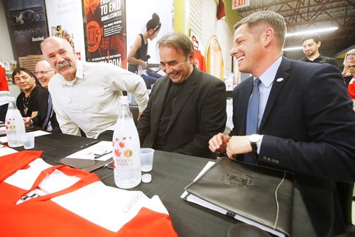 JOHN WOODS / WINNIPEG FREE PRESS
Former Winnipeg Jet and Hockey Helps the Homeless (HHTH) Ambassadors, Dave Babych, left, his brother Wayne and mayor Brian Bowman share a laugh during a HHTH press conference at Resource Assistance for Youth (RAY) in Winnipeg Tuesday, May 14, 2019. HHTH announced their Winnipeg tournament to assist local homeless service agencies. HHTH is a Canadian not-for-profit that hosts fantasy hockey tournaments, where amateur hockey players get to lace up with some of Canadas most admired NHL Alumni and Olympic Gold Medalists to raise awareness and funds that make a direct impact in their community. 
Reporter: Bell